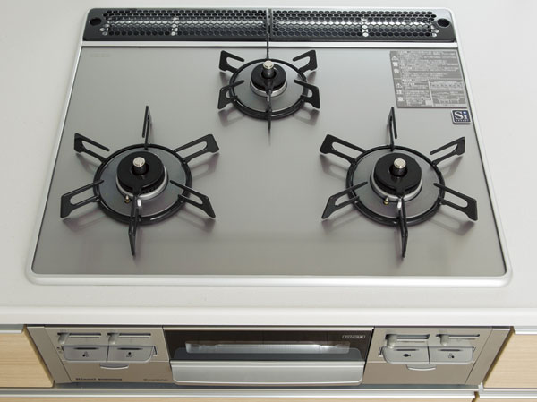 Kitchen.  [Glass top gas stove] Your easy-care glass top stove. And with anhydrous double-sided grill.