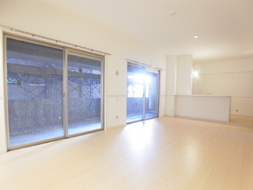 Living and room. It is facing windows of the two sides in the living room, It is bright space