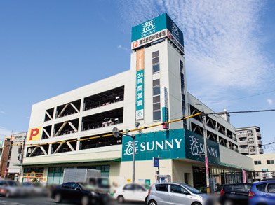 Surrounding environment. Sunny Higashihie shop / 24 hours a day (about 950m / A 12-minute walk)