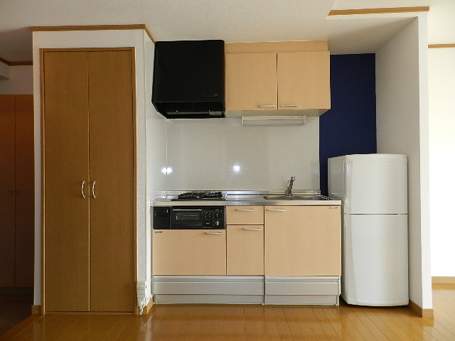Living and room. Refrigerator is not attached.