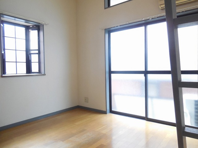 Living and room. It is very bright with windows full