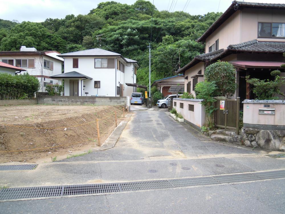 Local photos, including front road. It is a quiet residential area.