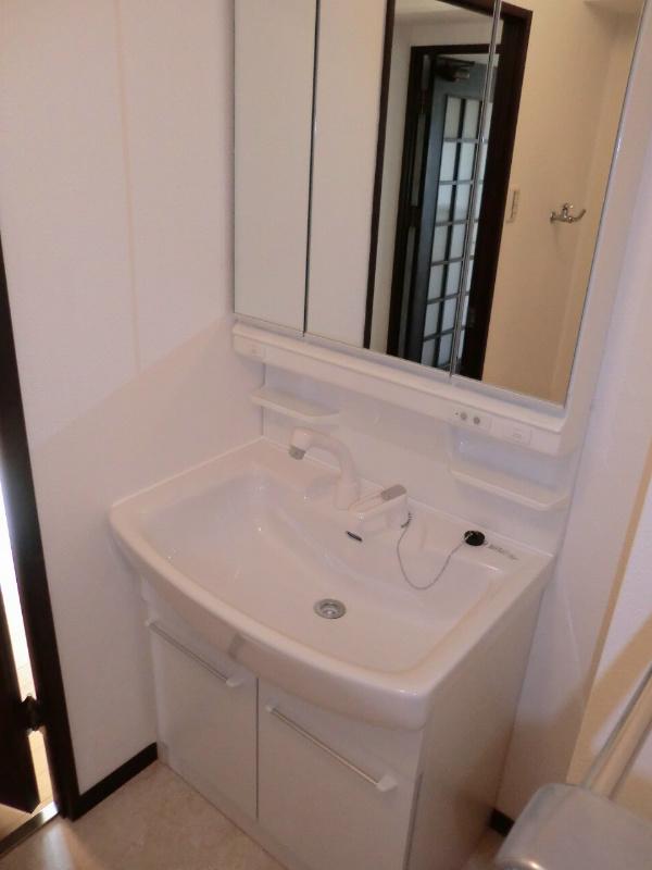 Wash basin, toilet. Vanity of new