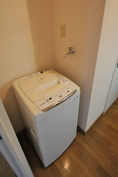 Other Equipment. Washing machine in the room