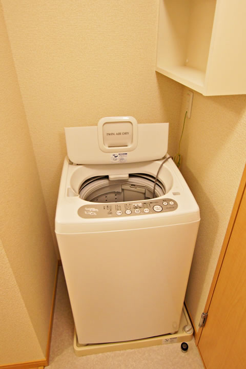 Other Equipment. Washing machine in the room