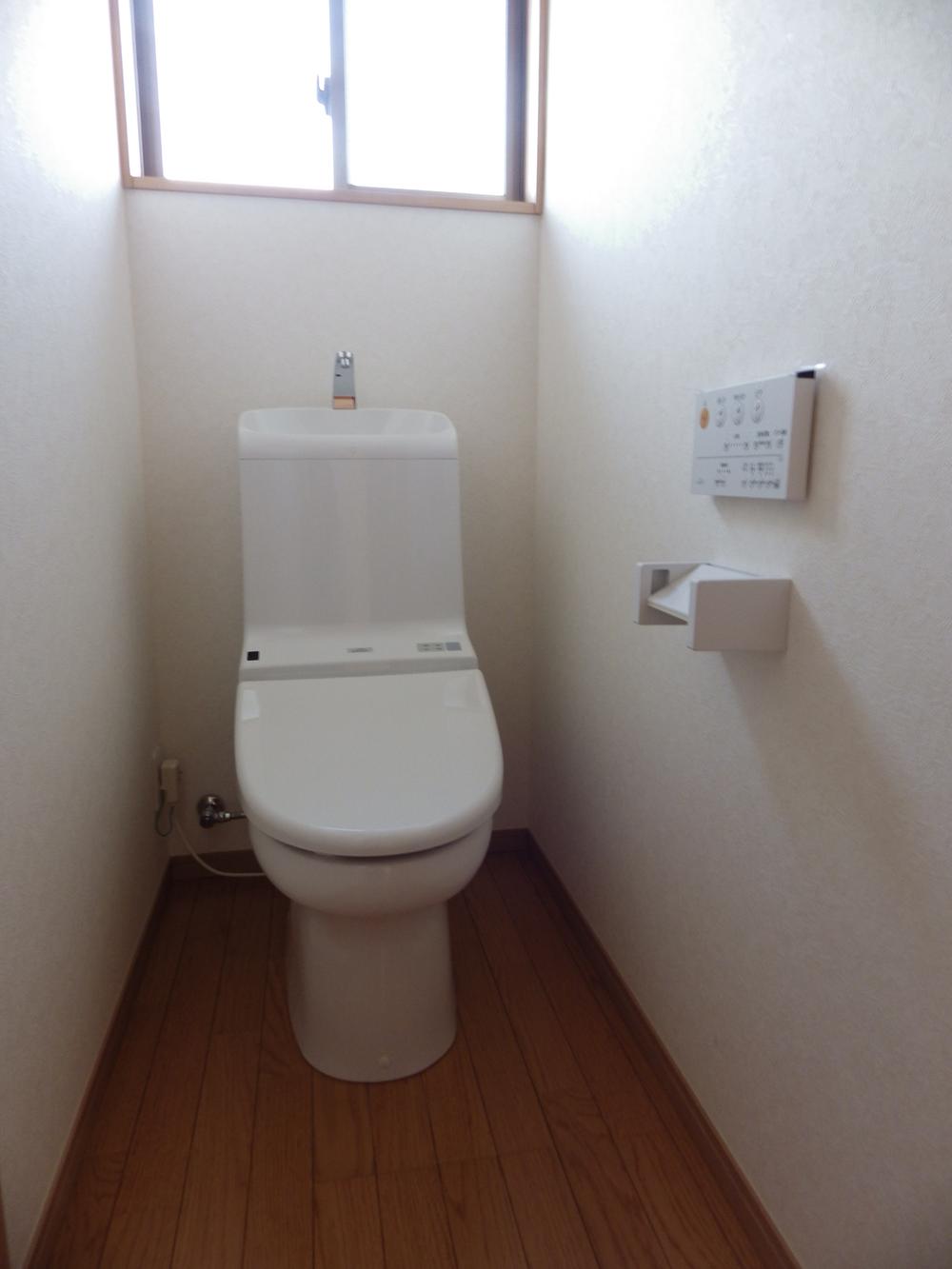 Toilet. Toilet with washing toilet seat