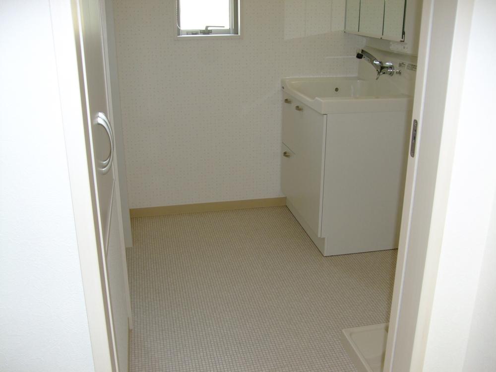 Wash basin, toilet. Second floor washroom