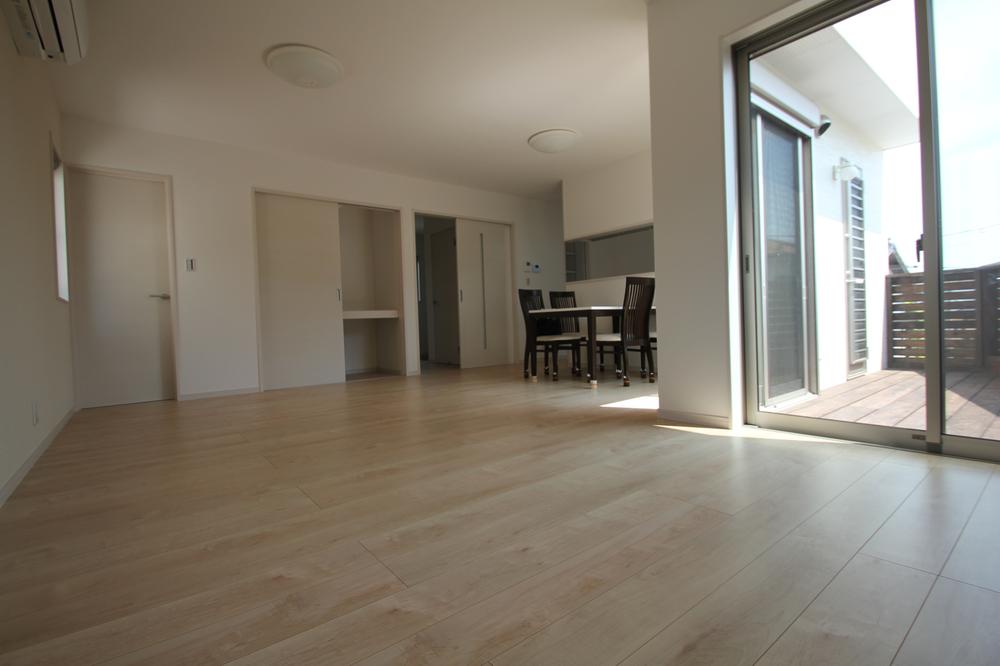 Living. Spacious living. It is also a good day from the wooden deck that is adjacent to.