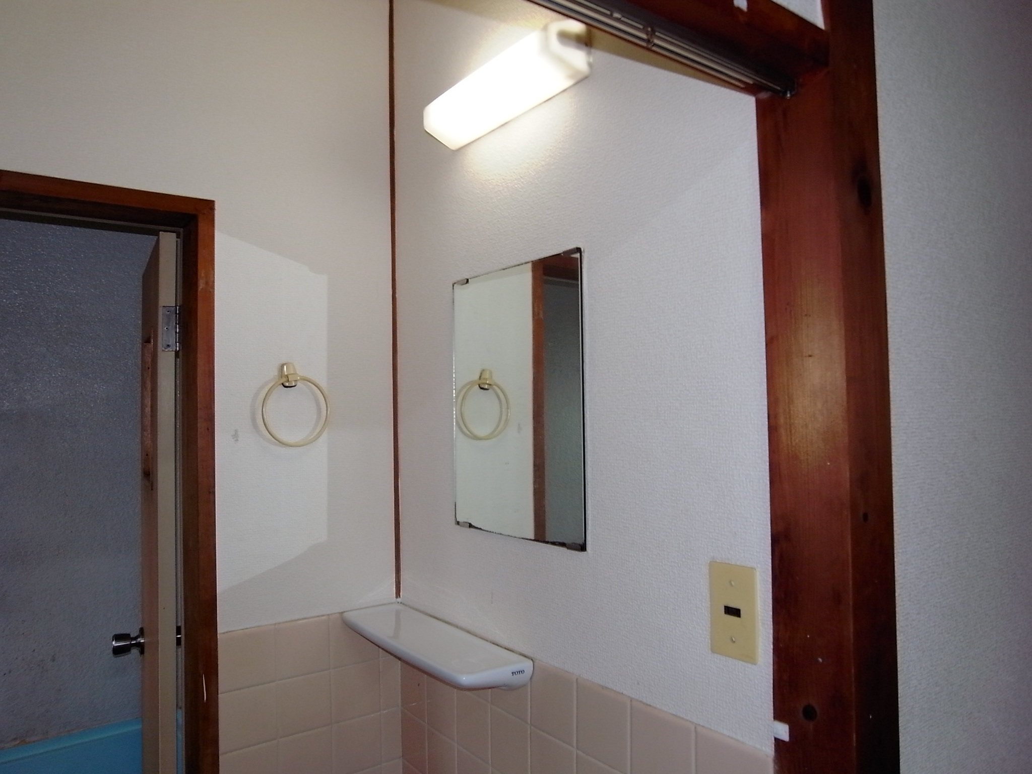 Washroom. There is a mirror in washroom