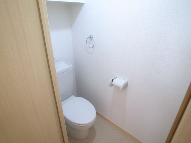 Toilet. Photos will be a separate room of the same type.