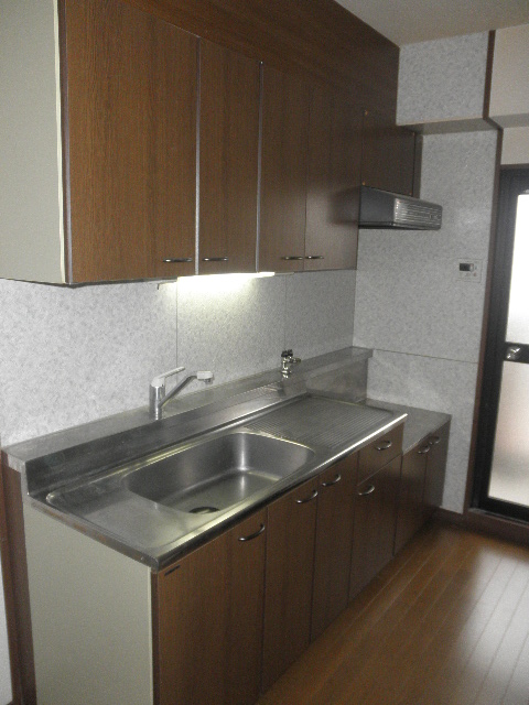Kitchen. Since the kitchen is spacious and accommodated many, I like a person who recommended cuisine