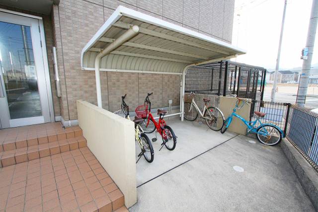 Other common areas. There are bicycle parking lot with a roof