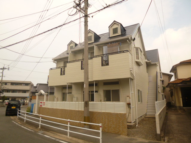 Building appearance. It is a quiet residential area.