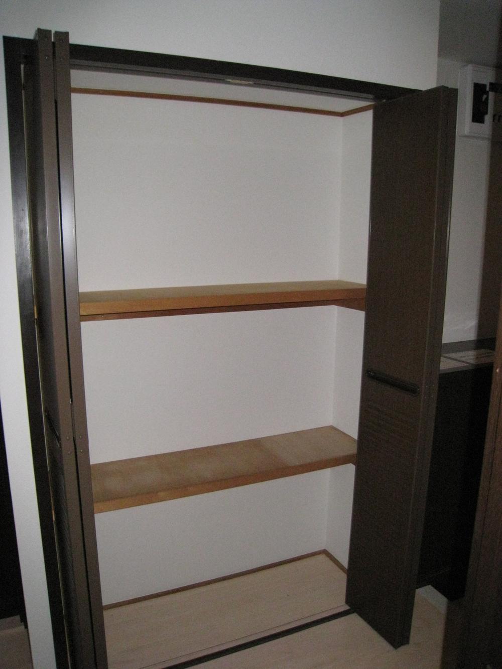 Receipt. It is a large storage shelves in the entrance hall!