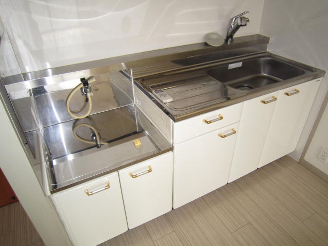 Kitchen. Two-burner gas stove installation Allowed