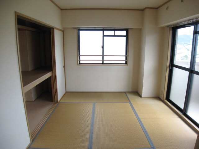 Other room space. It is a corner room