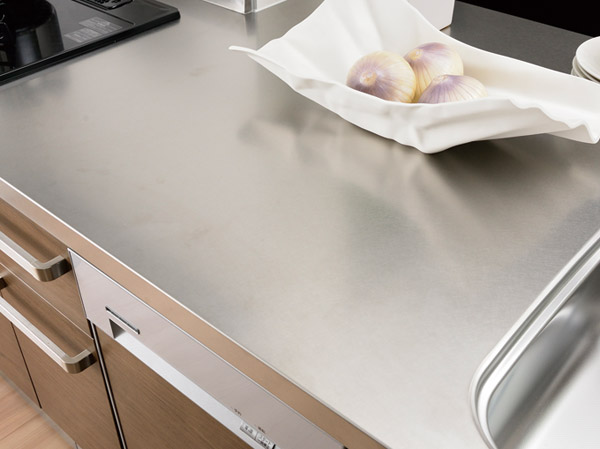 Kitchen.  [Stainless steel worktop] Stainless steel work top, Vibration polishing of the geometric pattern becomes accent, It further enhances the feeling of luxury. water resistant, It is safe hygiene excellent heat resistance. (Same specifications)