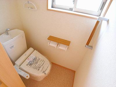 Toilet. The photograph is a property of the same manufacturer and construction