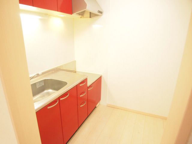 Kitchen. Also put a two-necked stove in the kitchen that uses a primary color