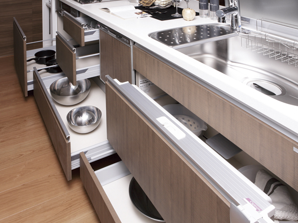 Kitchen.  [cabinet] Soft-close mechanism (slowly closing function) is equipped with a so closes the drawer quietly slip.