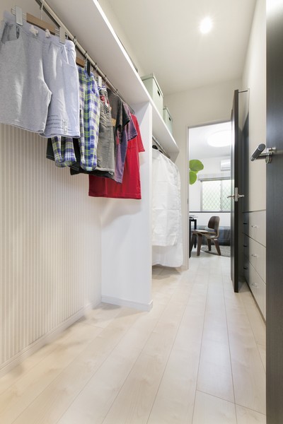 Set up a walk-through closet and family of clothing and bags will fit neat