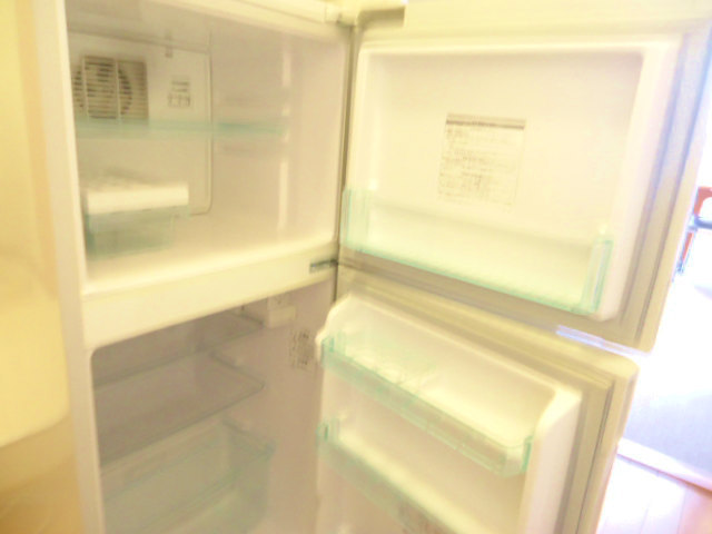 Other room space. It is with a refrigerator