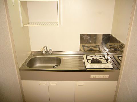 Kitchen. It is with a gas stove. 