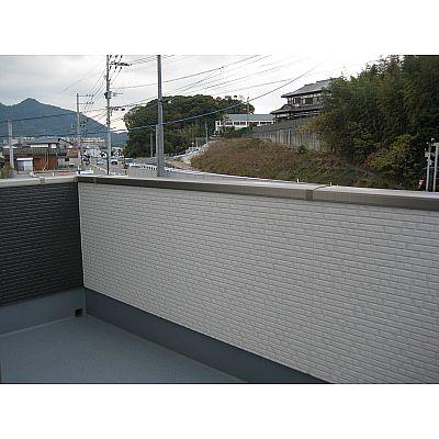 Balcony. Futon and laundry is well dry likely!