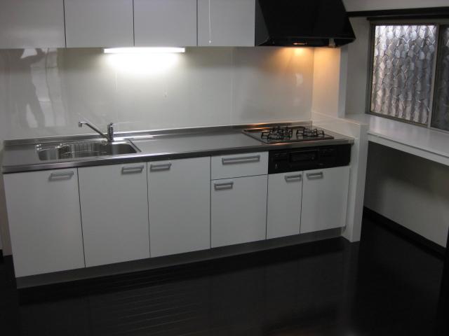 Kitchen. It has also become less noticeable darker stain color of the floor. 