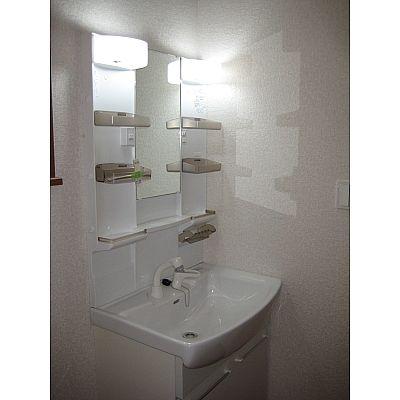 Wash basin, toilet. Bathroom vanity!