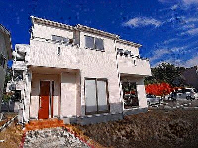 Local appearance photo. The photograph is a model house