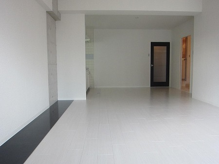 Living and room. Flooring is white tone