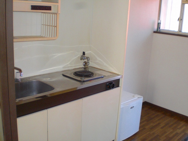 Kitchen. With a small refrigerator