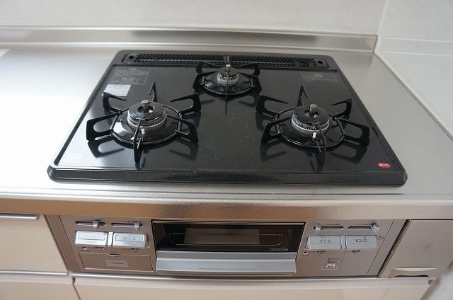 Same specifications photo (kitchen). Three-necked gas stove