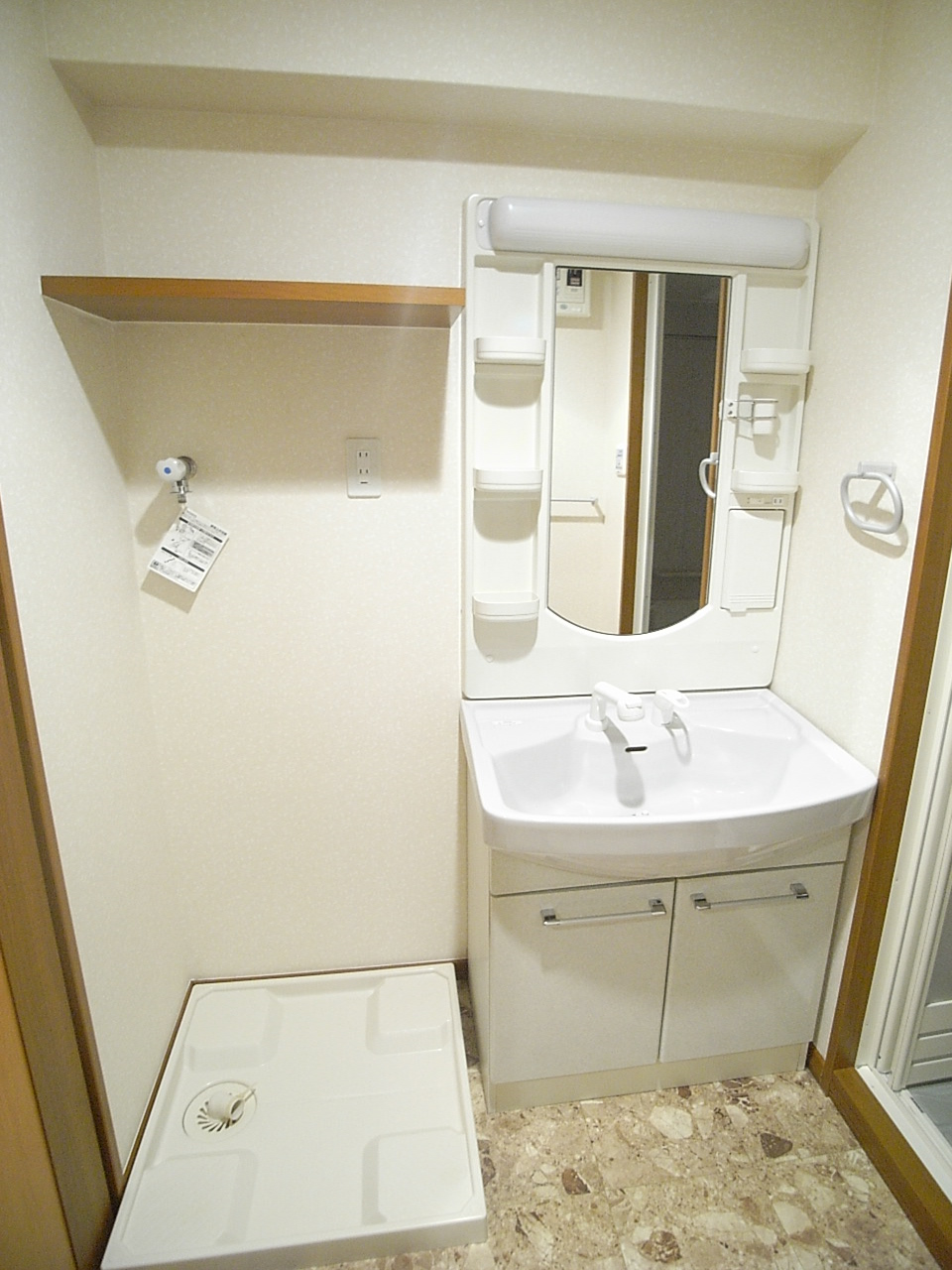 Washroom. Washing machine Storage Also storage space have the top