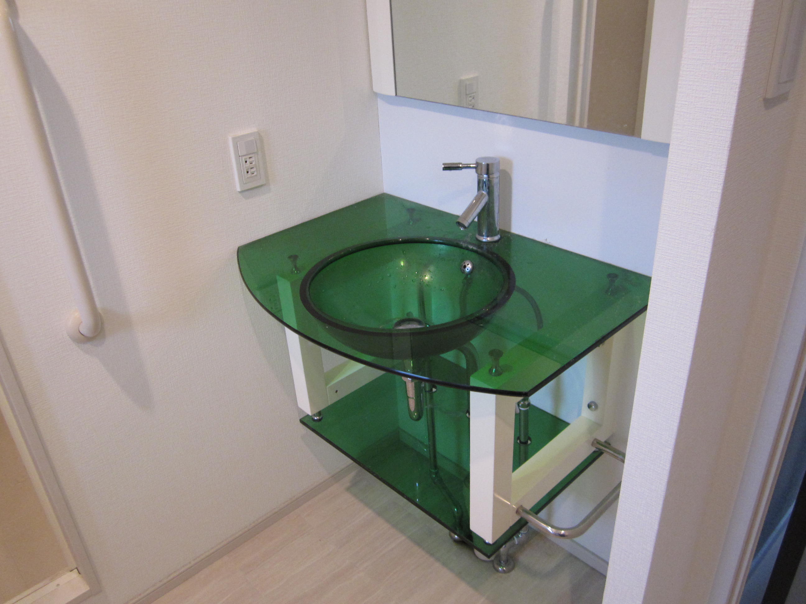 Washroom. Stylish glass basin