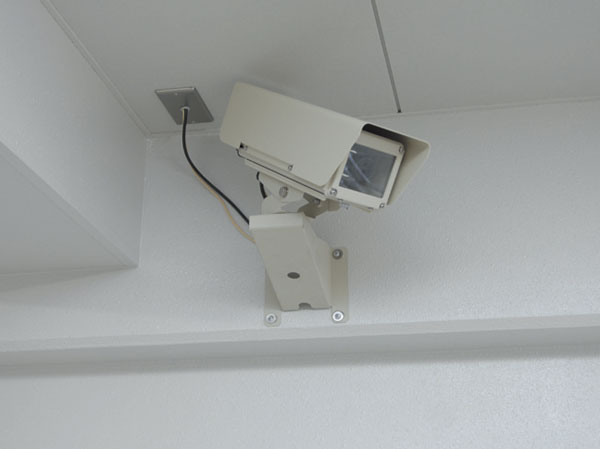 Security.  [Surveillance for security cameras] Installing a security camera in the entrance hall and parking lot. And record 24 hours video in digital recorder. If an accident occurs, It is done verification by the video. (Same specifications)