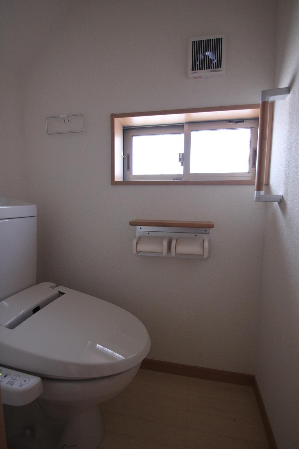 Toilet. The photograph is the same type