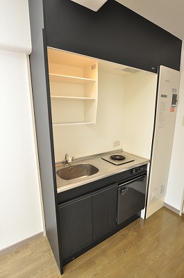 Kitchen. With a mini-fridge in the kitchen