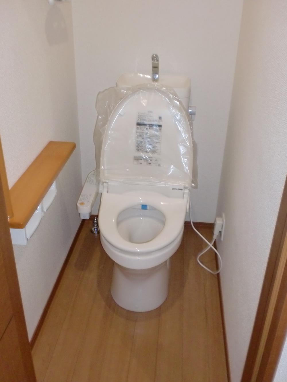 Toilet. It is a high-function toilet. 