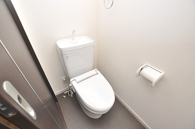 Toilet. A heated toilet seat