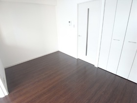 Living and room. Dark color of the floor is fashionable
