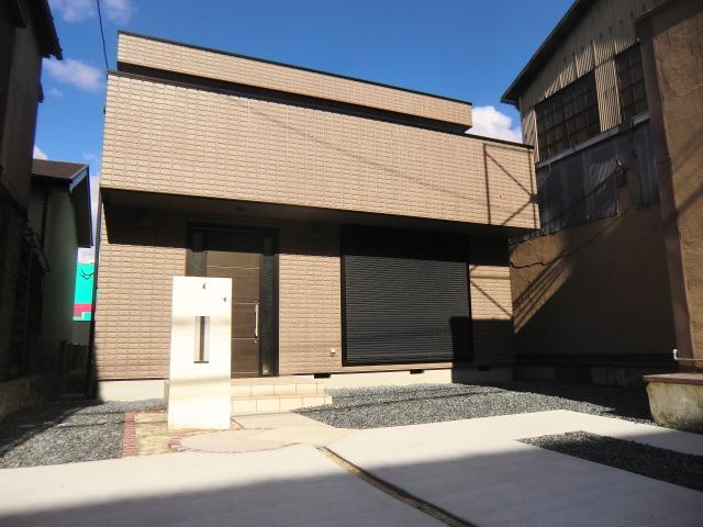 Local appearance photo. There are three parking spaces