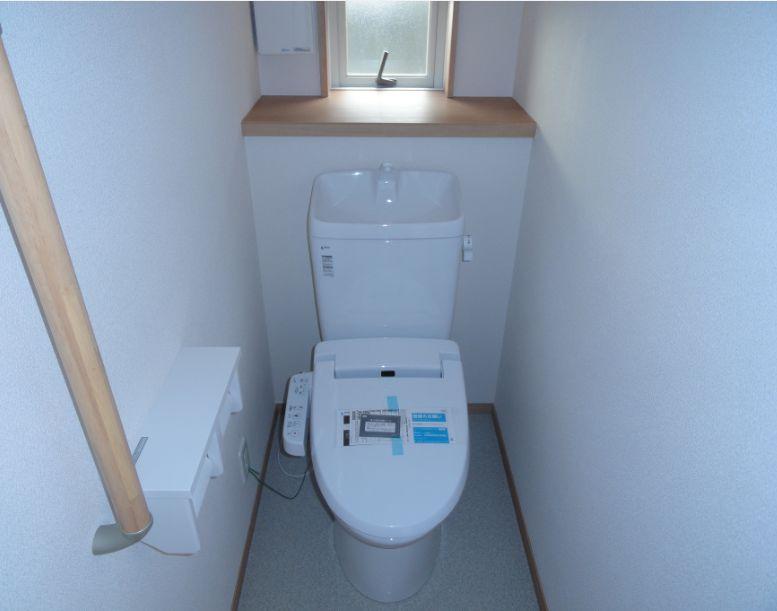 Toilet. The photograph is the same type.