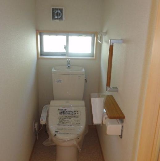 Toilet. The photograph is the same type