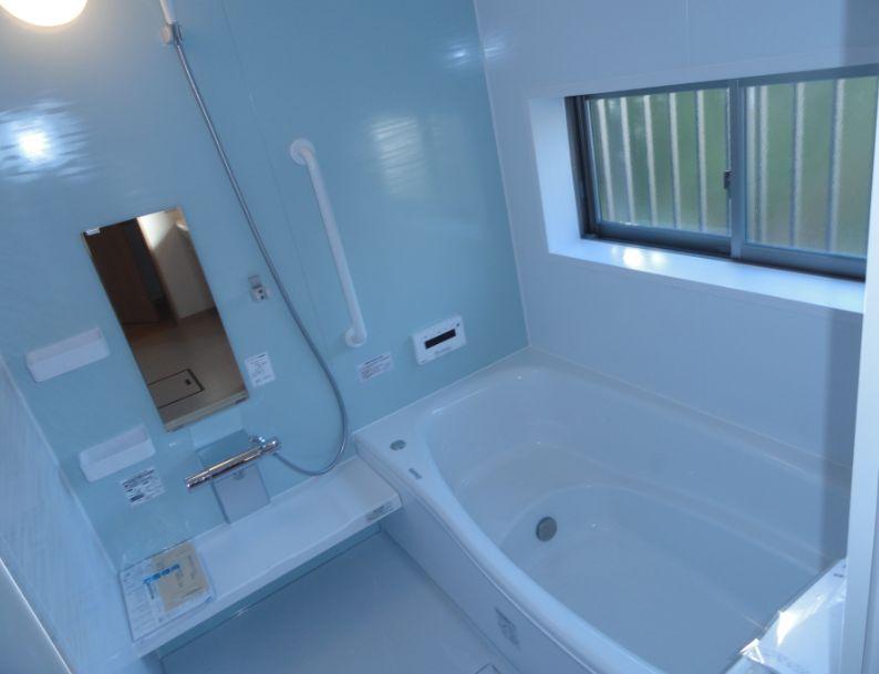 Bathroom. The photograph is the same type