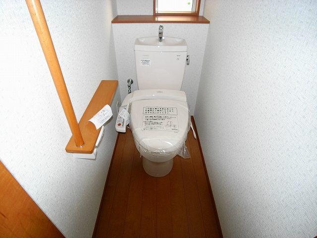 Toilet. The photograph is a property of the same manufacturer and construction