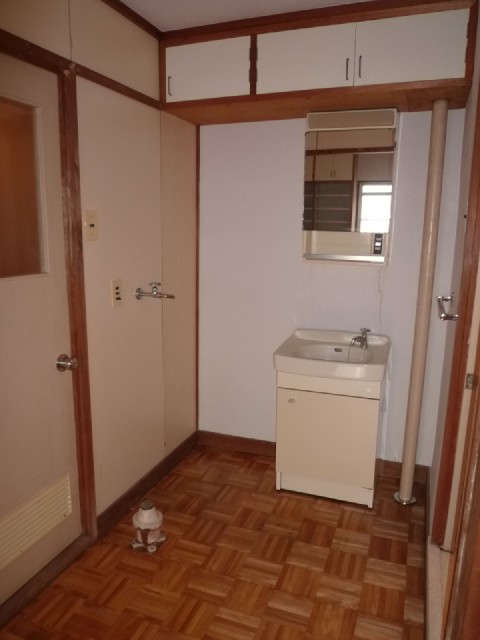 Other room space. Laundry Area and washbasin
