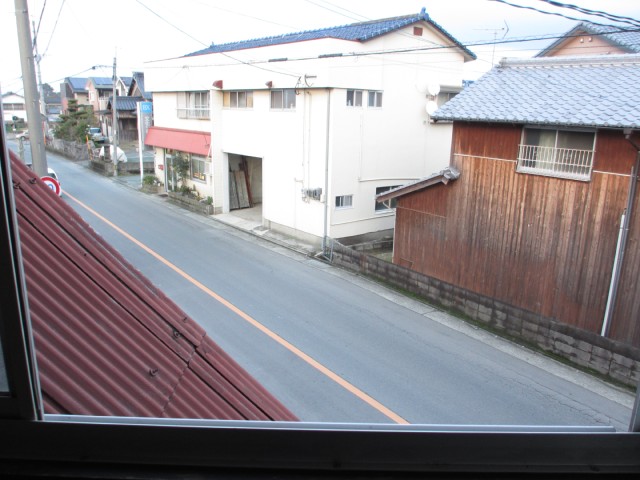 Other room space. The view from the window of the kitchen side