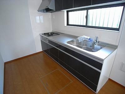 Kitchen.  [The photograph is a property of the same manufacturer and construction] System kitchen. Since the gas stove is a three-necked, Convenient to your cooking!